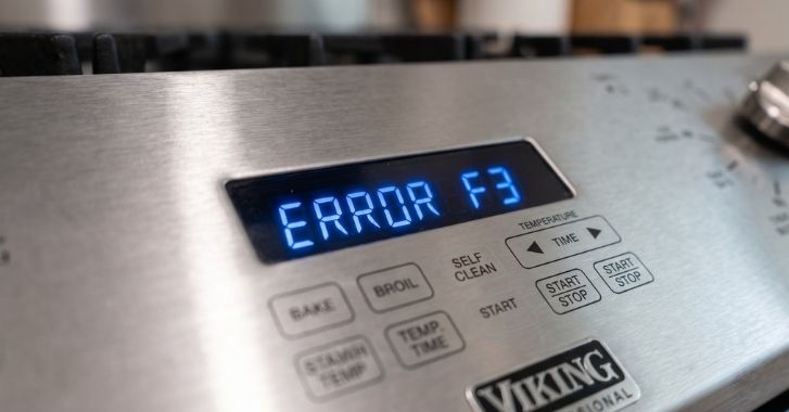 Close-up of a Viking range digital control panel displaying a fault code