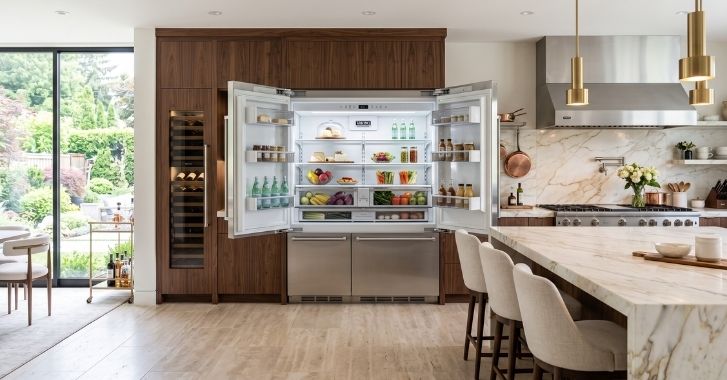 Viking Professional built-in refrigerator open in a high-end kitchen